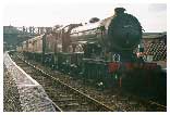 61572 Stands at Weybourne with the 14.59 for Sheringham 9th Sept 2000